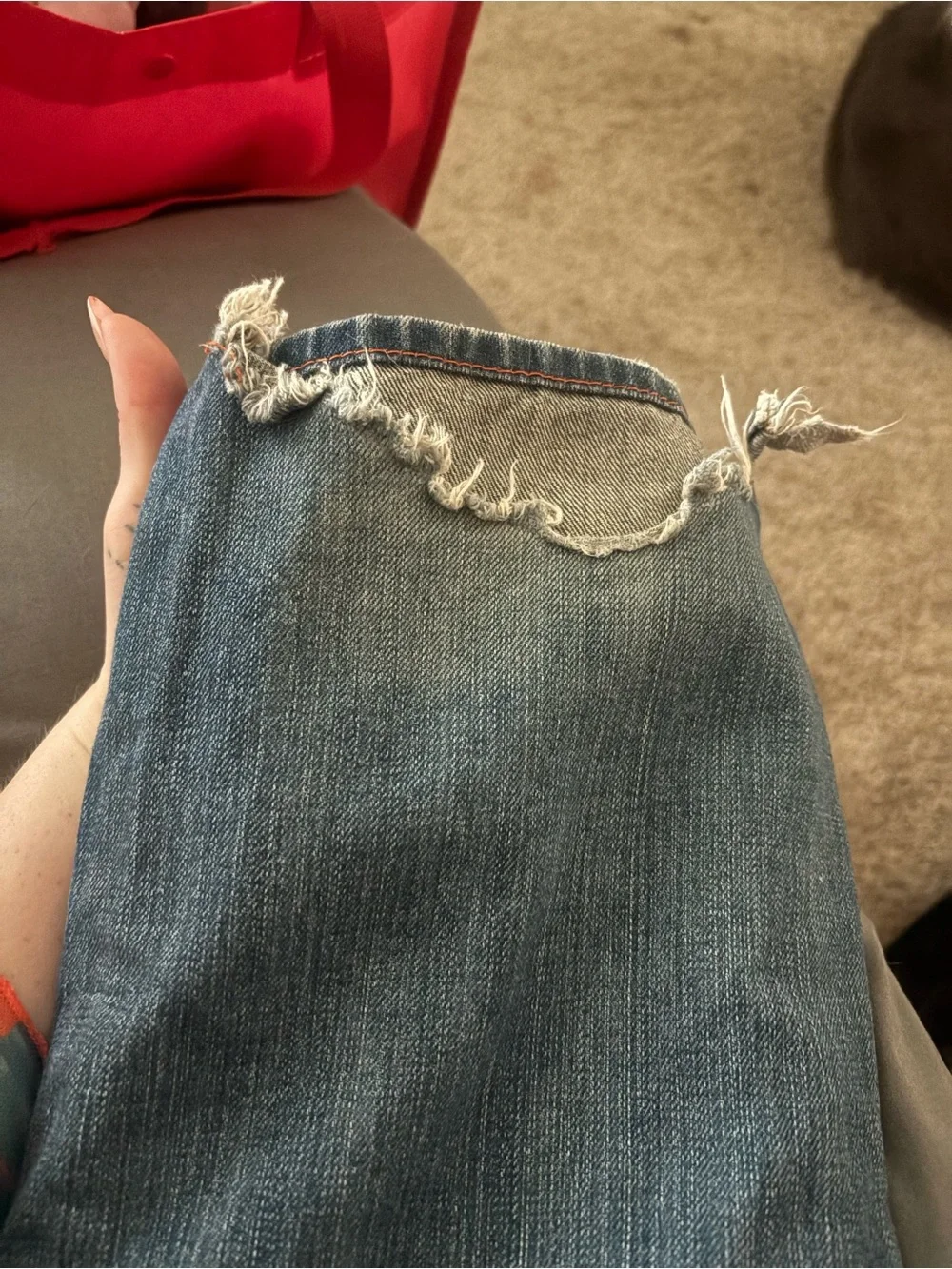 True Religion Men's Straight Jeans in Medium Blue with Distressed Hem